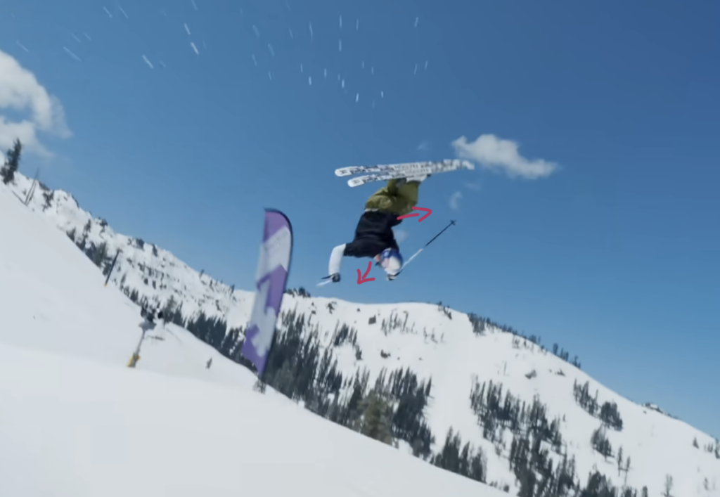 Skier performing first part of trick