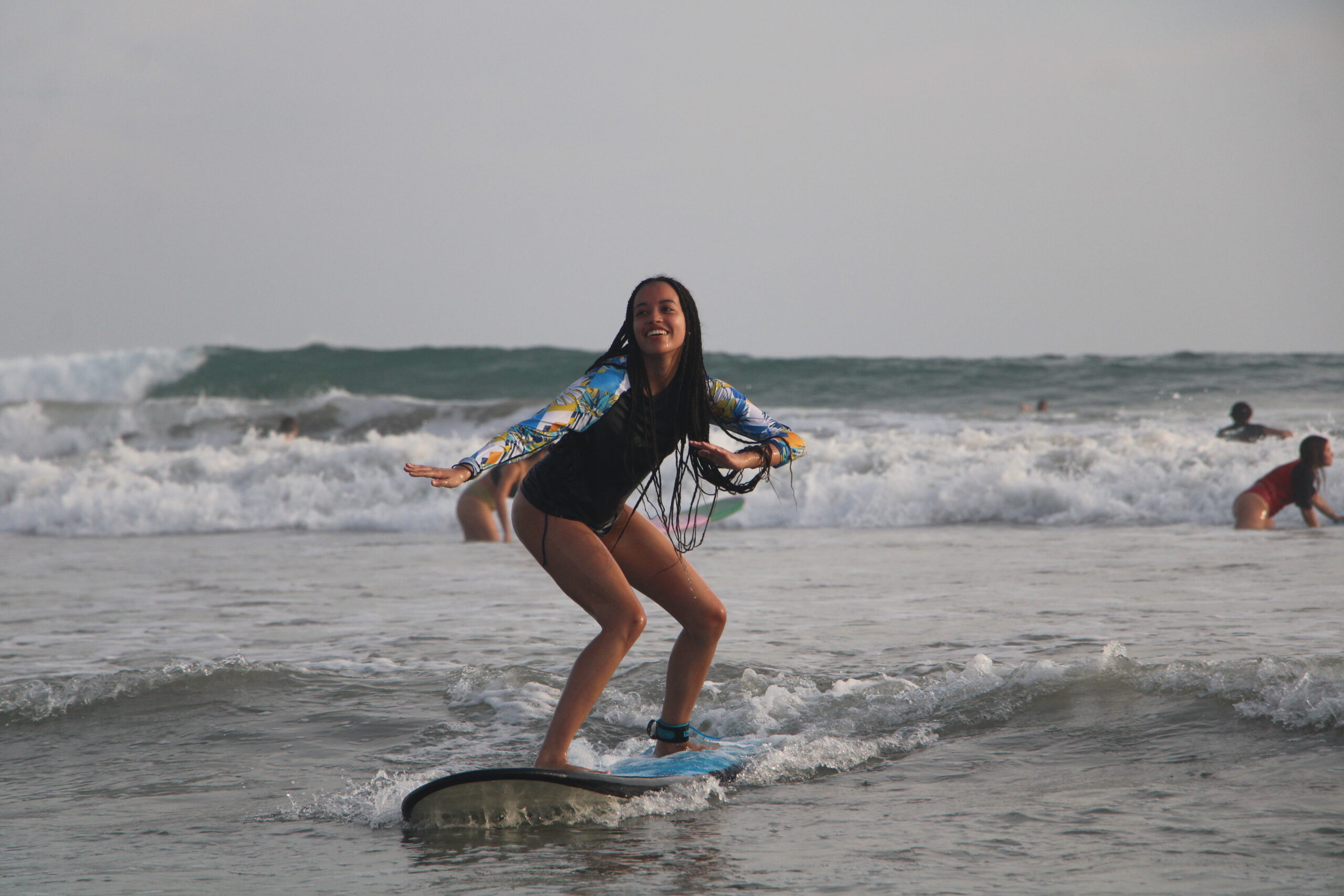 A young surfer enjoying her time with Mahalo Surf Club.