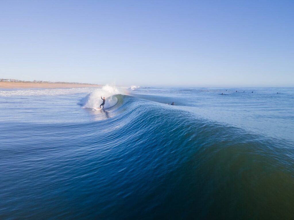 A wave with a surfer riding it in Uruguay