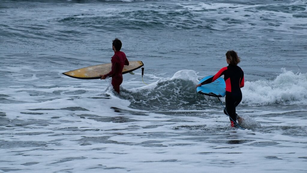 Surf Lessons happening in the ocean