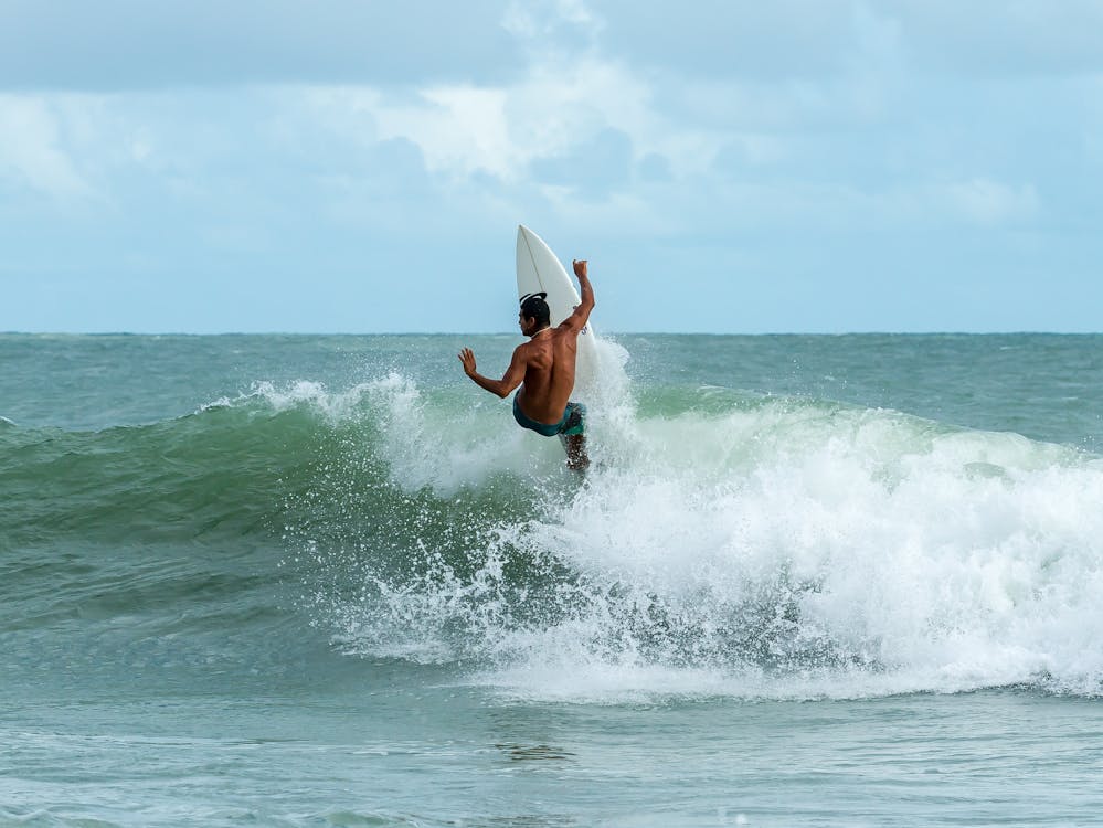 Surfer doing a snap on a wave in Nicaragua