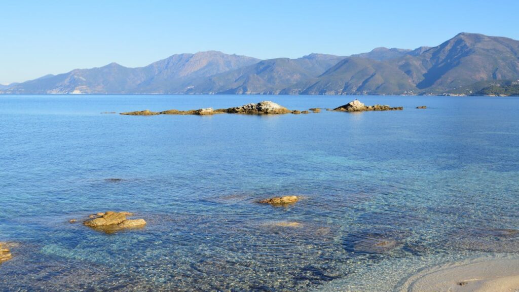 Ocean, the beach, and little bit of mountains in the background