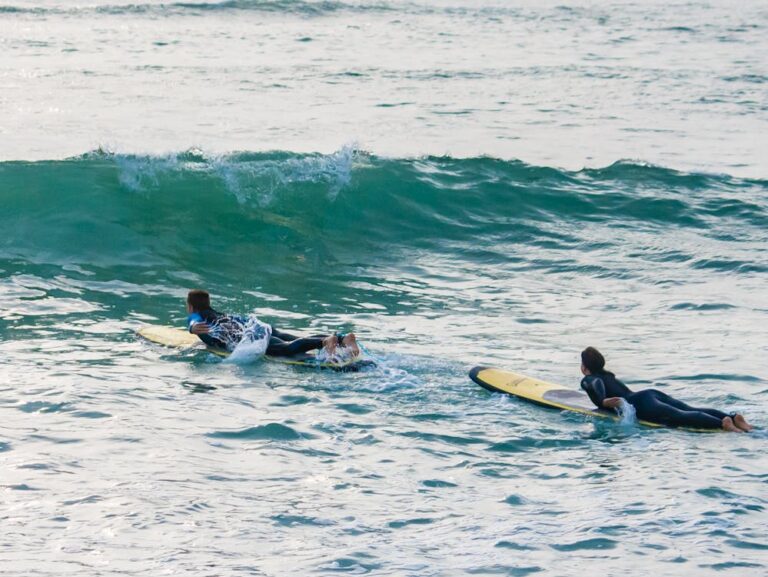 Long boarders paddling out