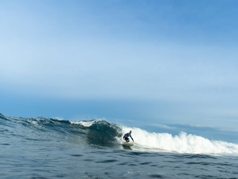 Surfer riding a wave in Engabao