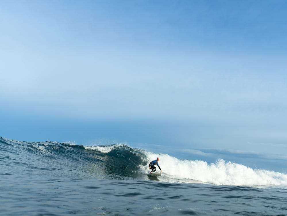 Surfer riding a wave in Engabao