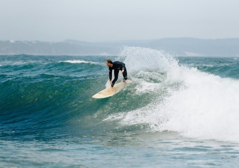 Some surfer riding a wave in Victoria Bay.