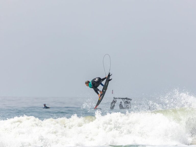 Surfer doing an air in the water