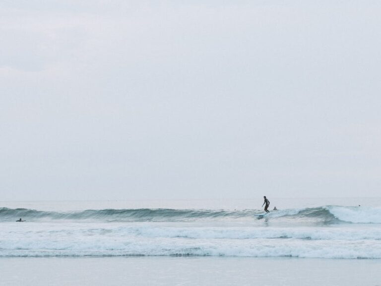 Surfing in Brazil a longboarder walks a wave