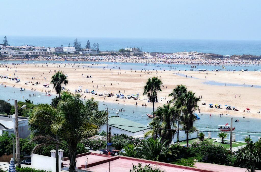 The beach scene in Oualidia during a hot summer day.