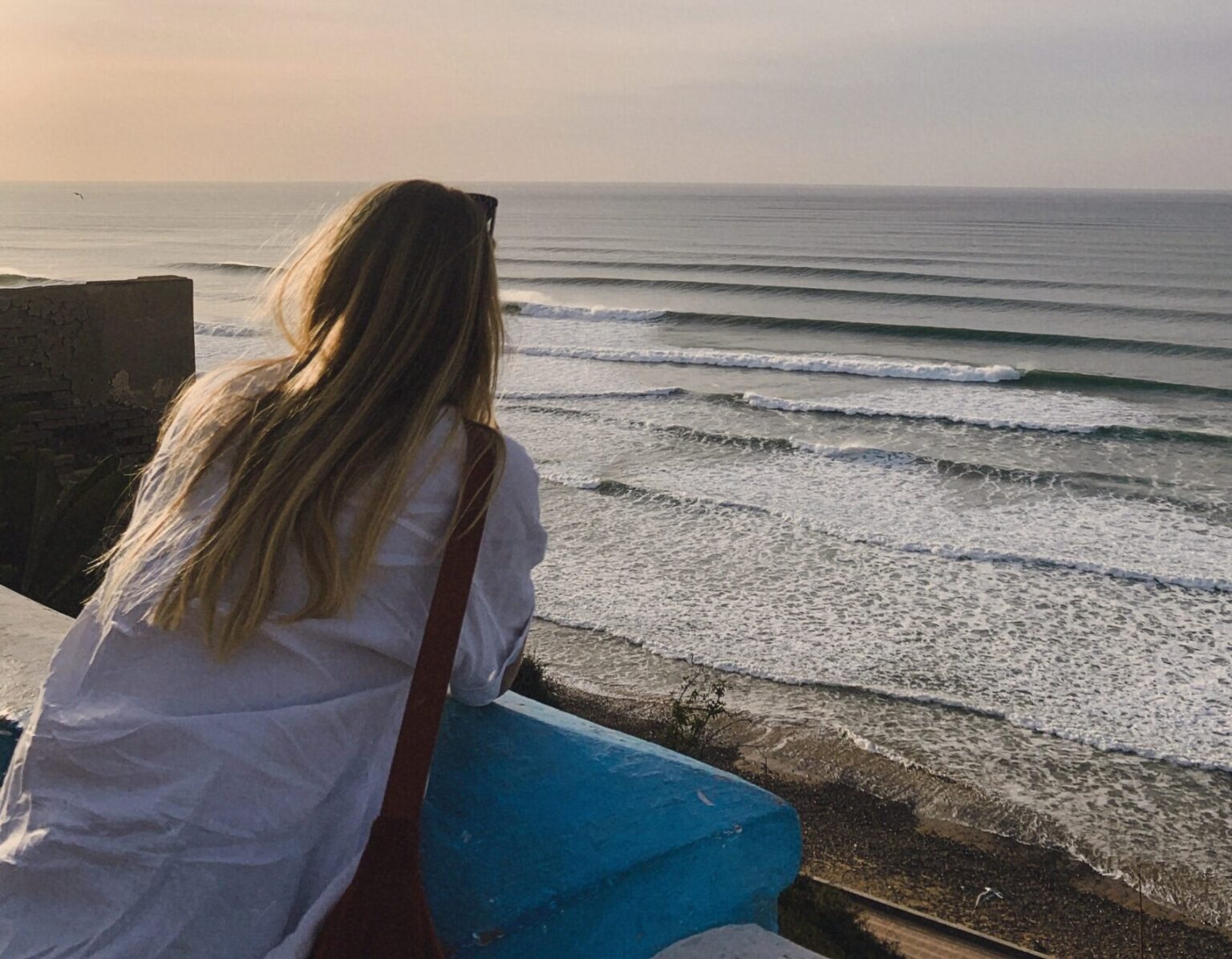 One of Moja Surf Maroc's guests enjoying the coastline views of Sidi Ifni.
