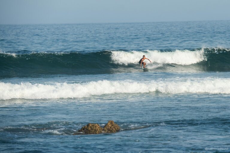 A surfer enjoying a wave along the coastline of San José del Cabo, in Costa Azul.