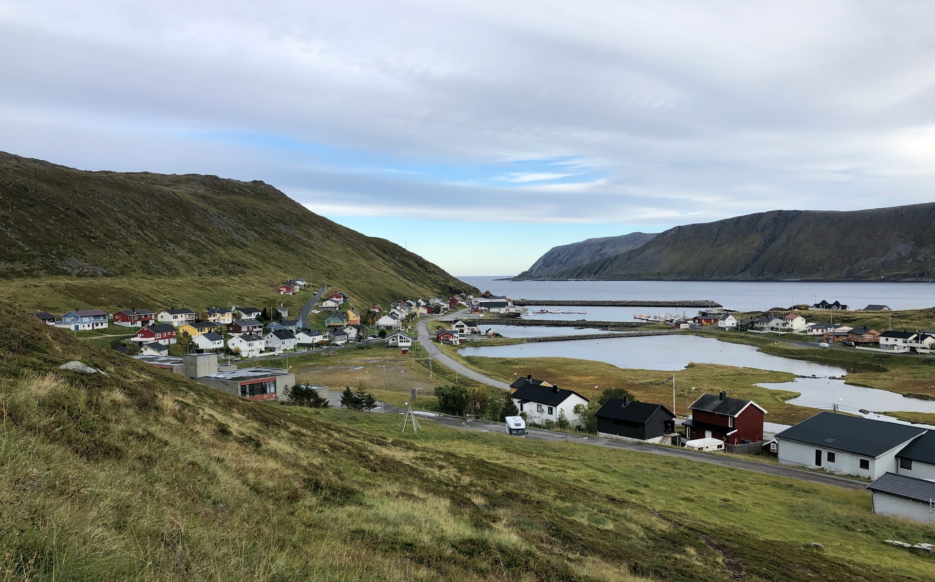 Some of the beautiful scenery of green fjords, towns, and innlets of water.
