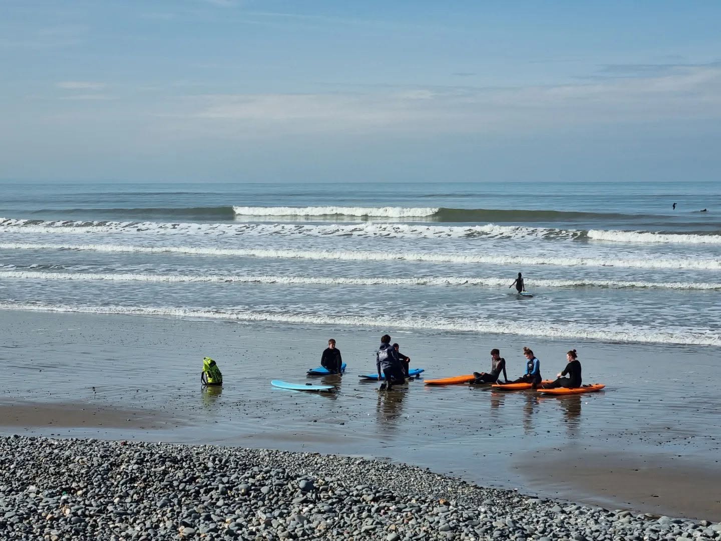 Borth in its full beauty, with a surf lesson going on with AberAdventures.