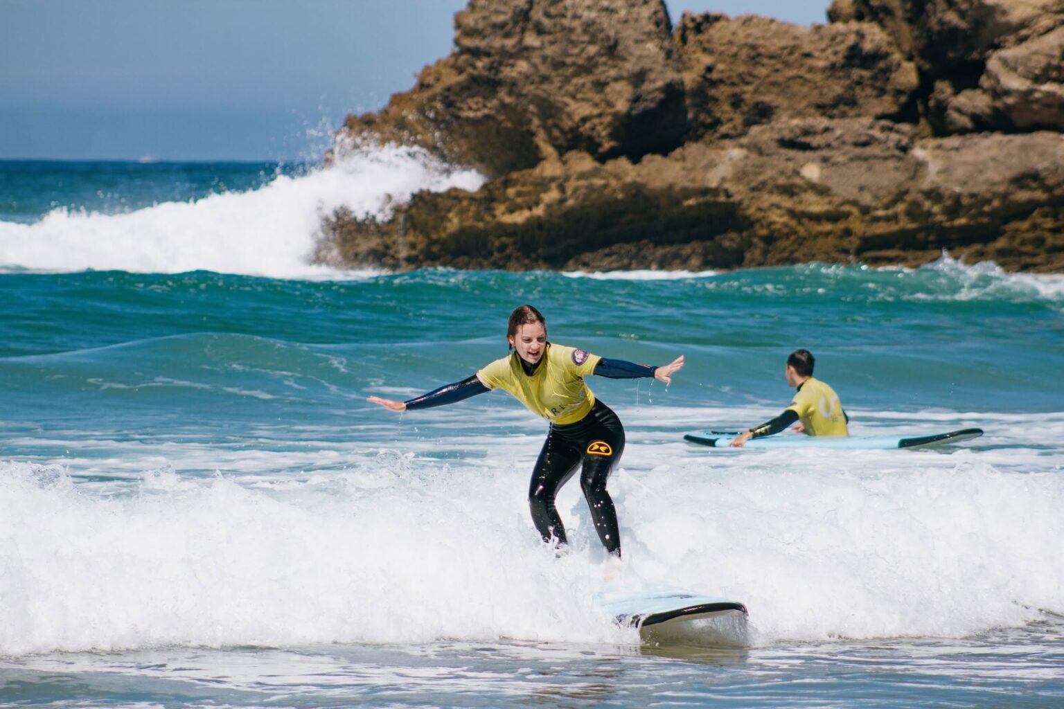 A beginner enjoying a lesson with Future Eco Surf.