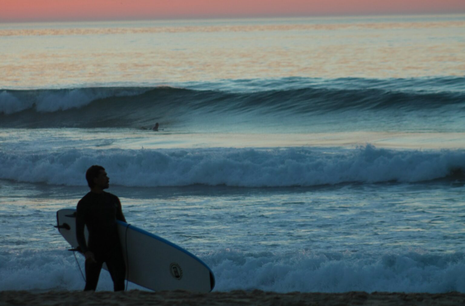Just a good sunset photo of a surfer enjoying a wave in Santa Cruz.