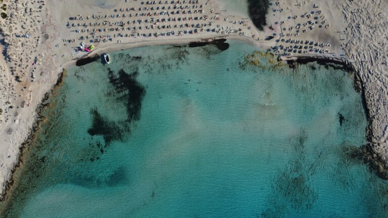 A birds eye view of the famous Belos beach with see-through water.