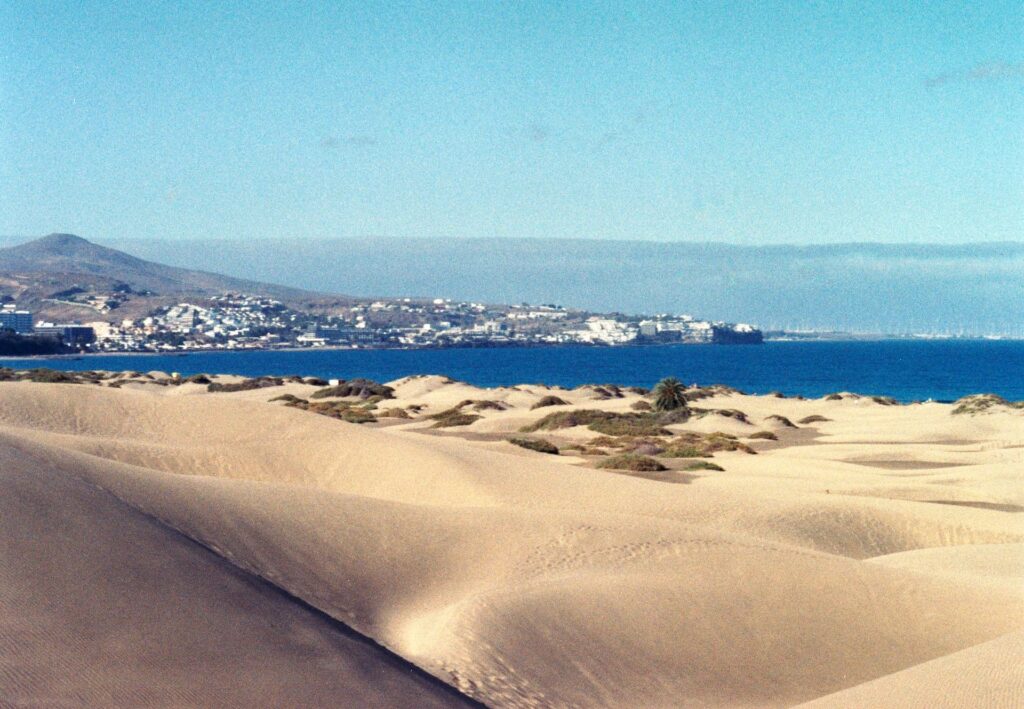 A shot of Las Palmas from the dunes to the right of Arguineguín.