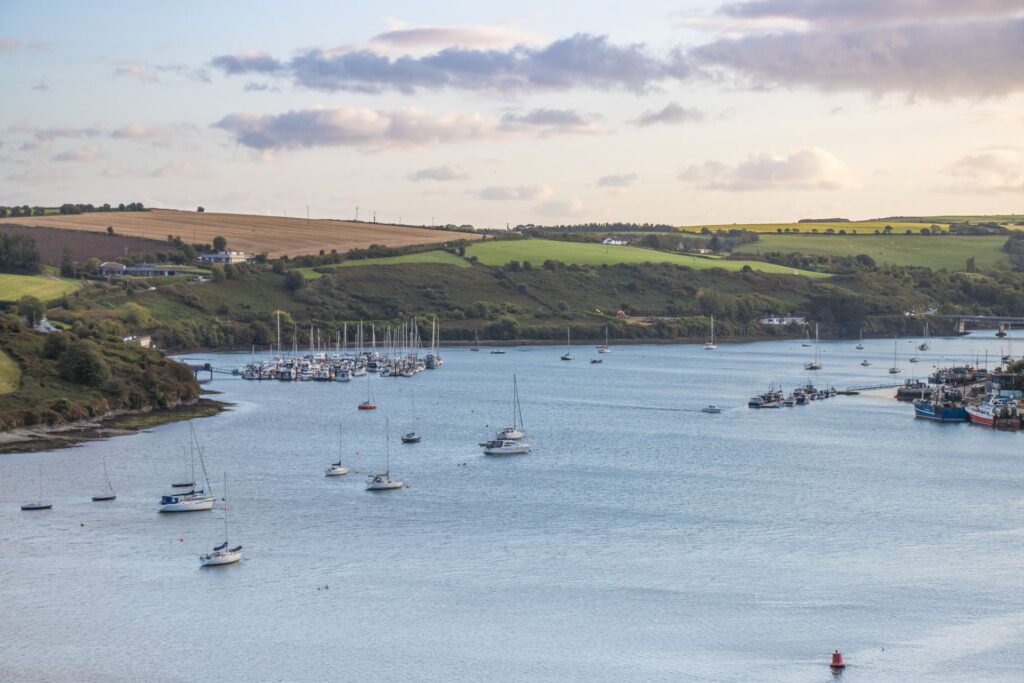 The bay of Kinsale in Ireland, with boats floating.