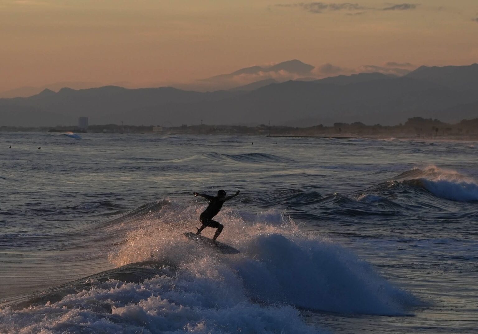 Beautiful shot of a surfer riding a wave.