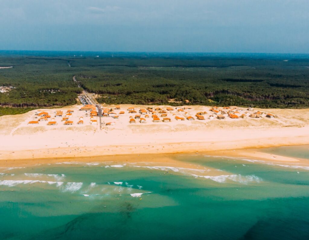 Plage Saint Girons and the neighboring village in full summer view. Photo provided by Saint Girons Surf House.
