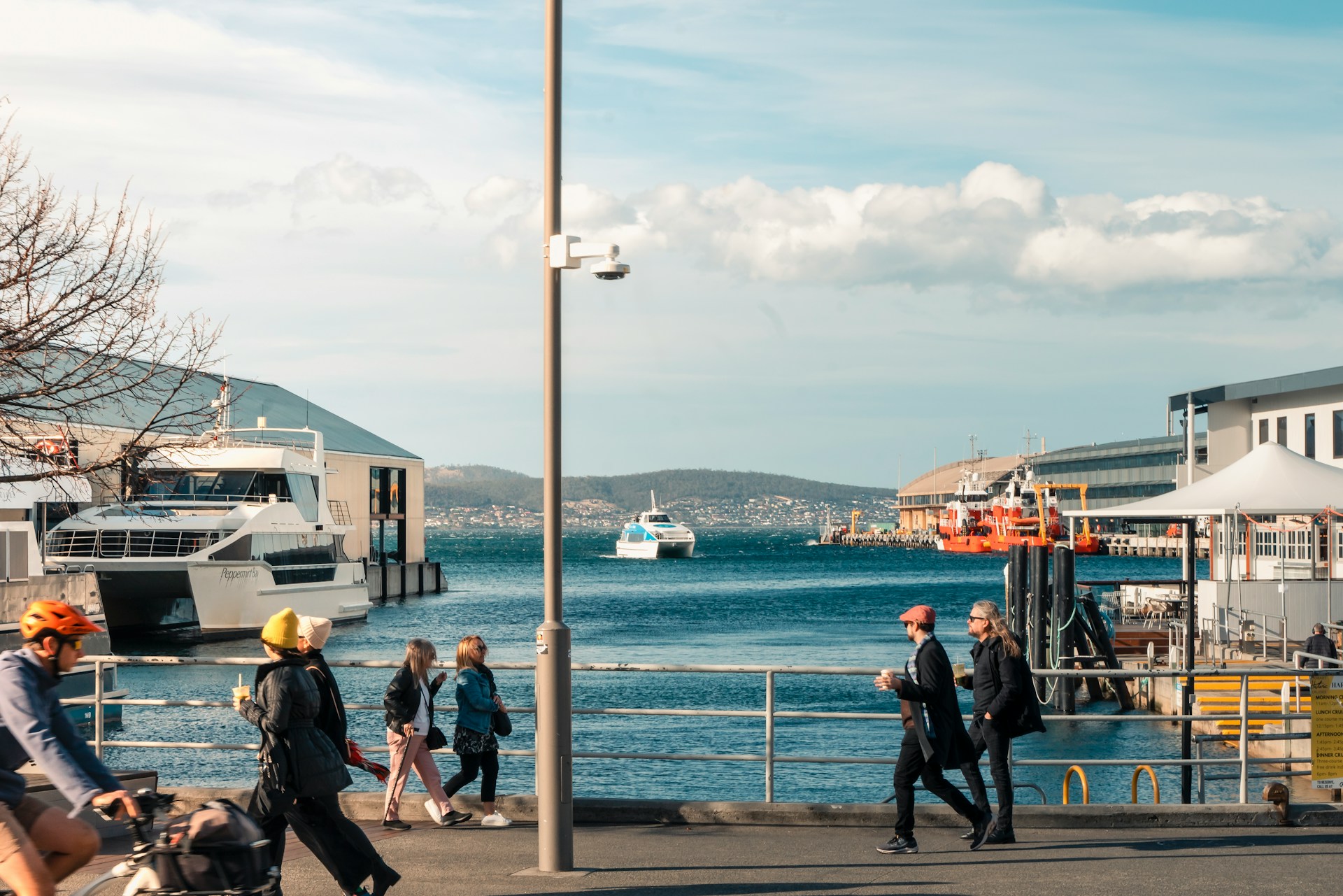 Some pedestrians walking around Hobart, Tasmania.