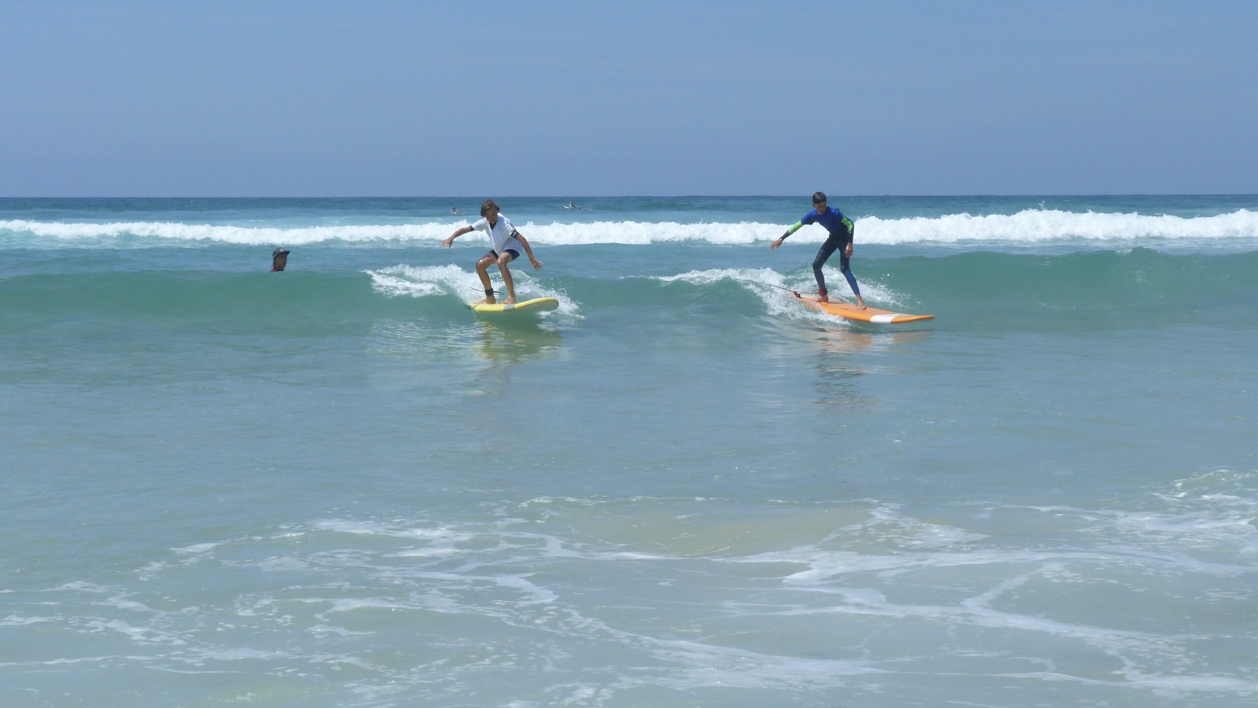 Some surfers enjoy the nice calm waters of La Salie. Photo provided by It's On La Salie.