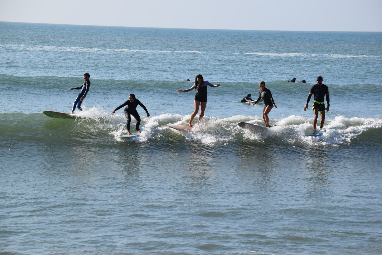 A party wave with the guests of La Crique Surf House.